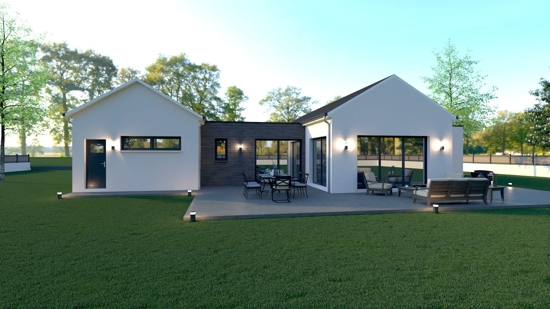 Maison X LSF 005, vue arrière sur grande terrasse avec coin repas et salon, façades blanches à pignons et bandeau central en bardage anthracite.